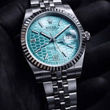 Rolex Datejust 41 Turquoise Motif Dial Fluted Bezel Jubilee